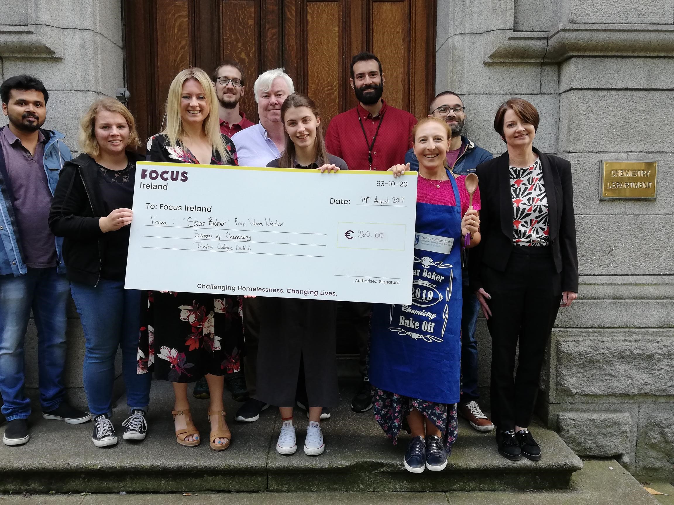 Presentation of cheque to Focus Ireland Rep