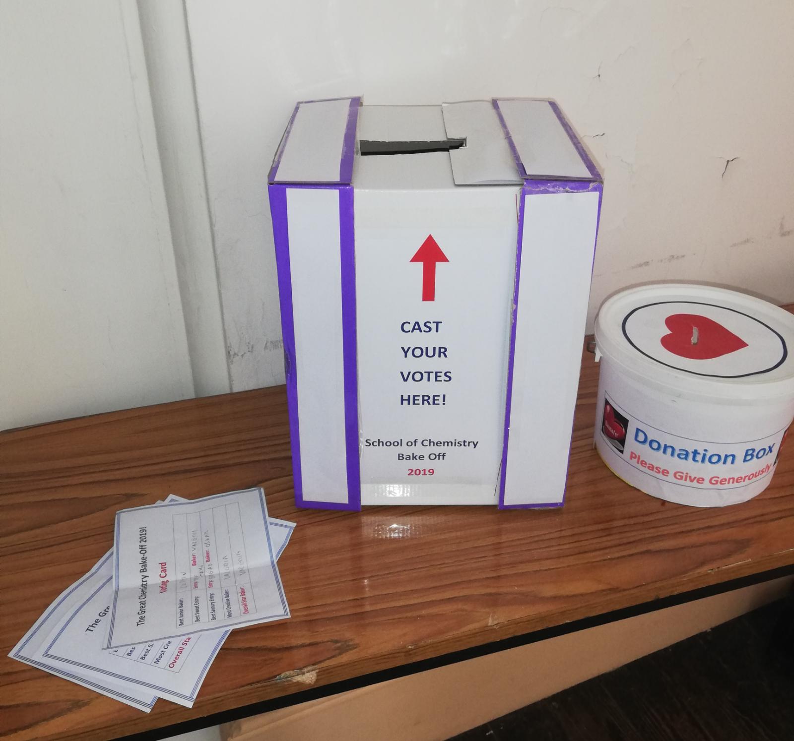 Voting box and donation bucket