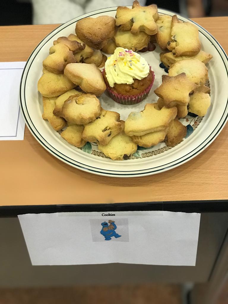 Cookies surrounding a cupcake