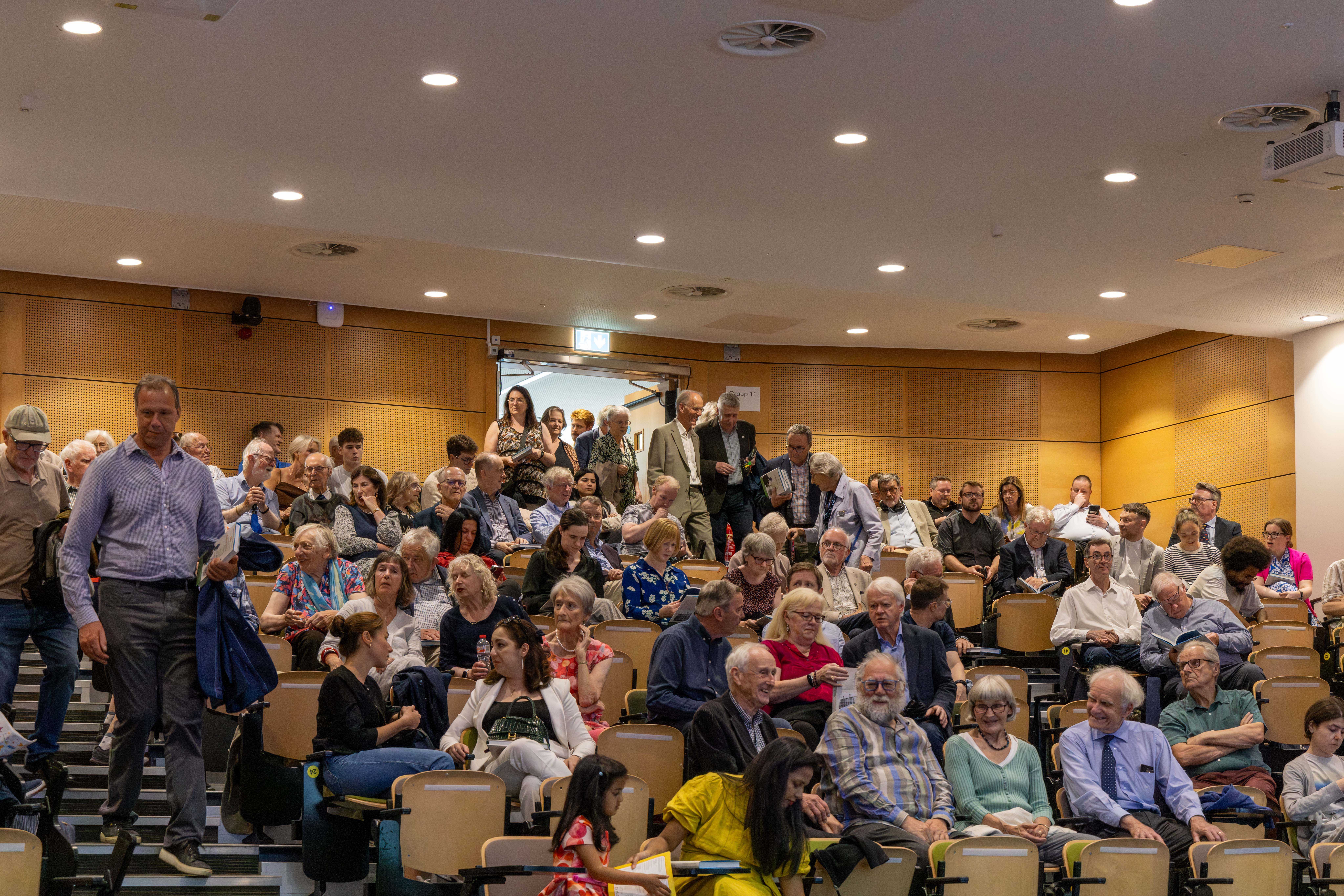 Attendees arrive to the Tercentenary Hall before the seminar