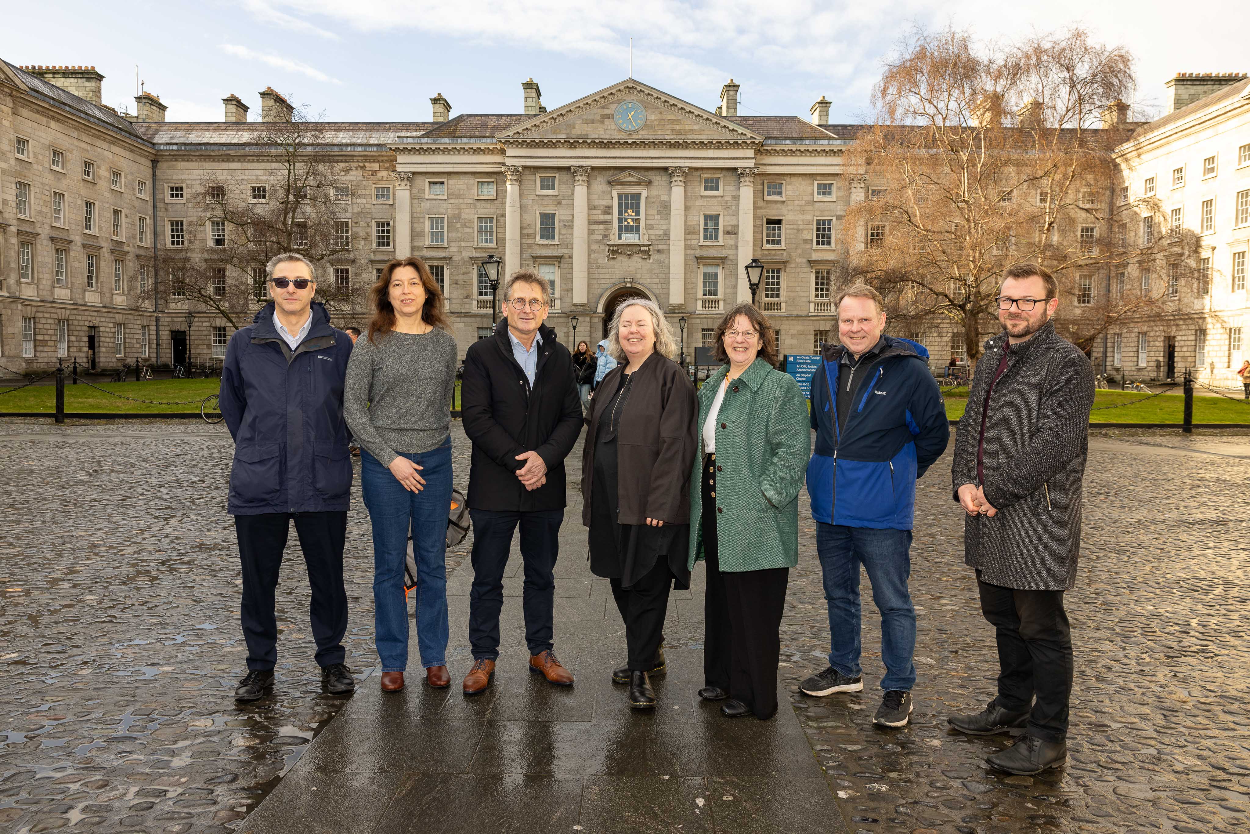 Prof. Ben Feringa (third from left) in Trinity's Front Square, with Provost, Dr Linda Doyle, Dean of the Faculty of STEM, Sylvia Draper, and key members of the School of Chemistry