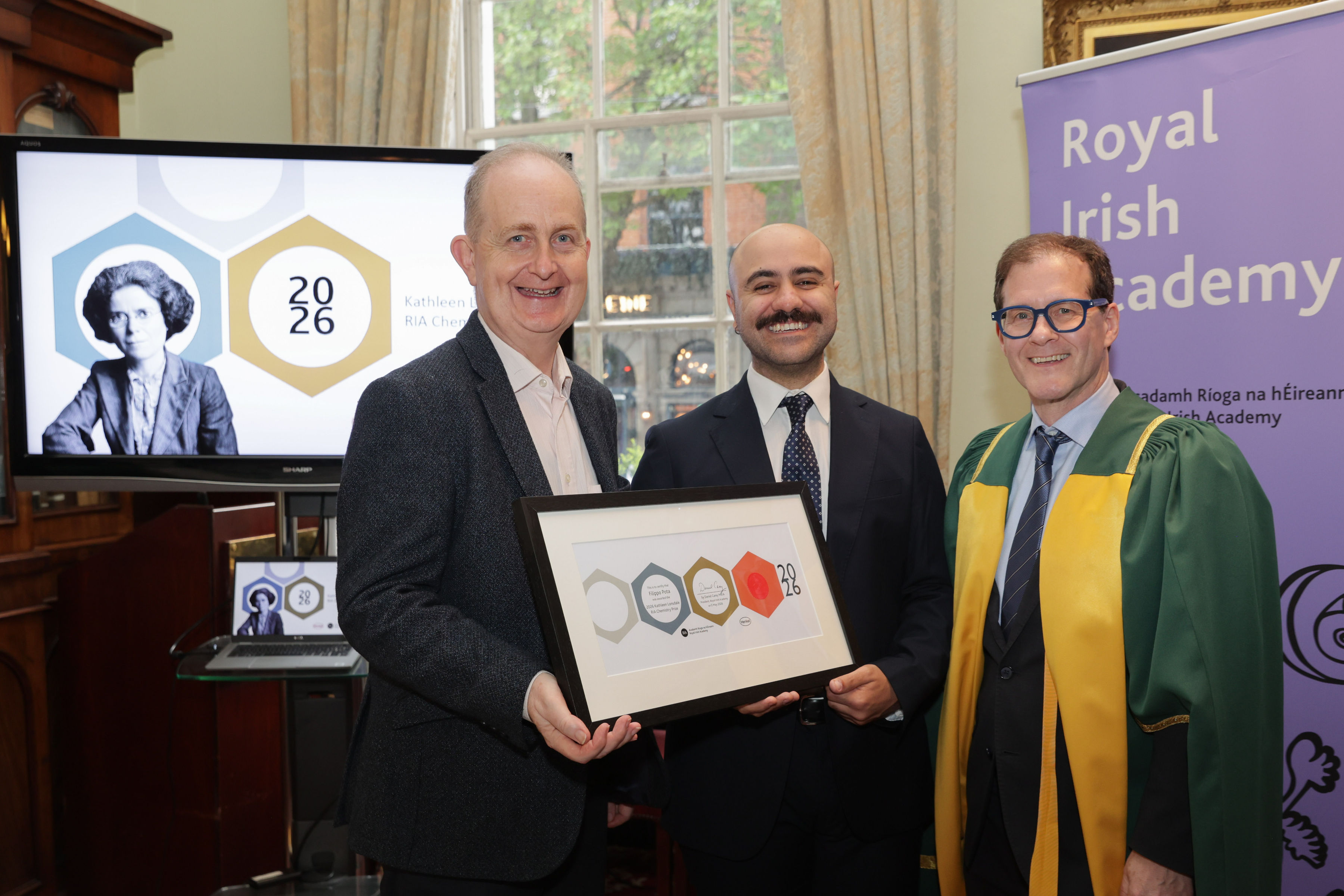Dr Filippo Pota is presented with his Prize Certificate