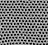 Picture of ordered array of cylindrical pores in polystyrene